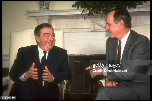 Pres. Bush mtg. W. Soviet Mideast envoy Yevgeny Primakov re gulf crisis , in WH Oval Office.