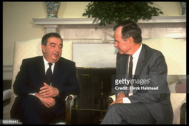 Pres. Bush mtg. W. Soviet Mideast envoy Yevgeny Primakov re gulf crisis , in WH Oval Office.