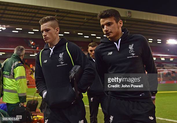 Ryan Kent of Liverpool and Pedro Chirivella of Liverpool arrive before The Emirates FA Cup Third Round Replay between Liverpool and Exeter City at...