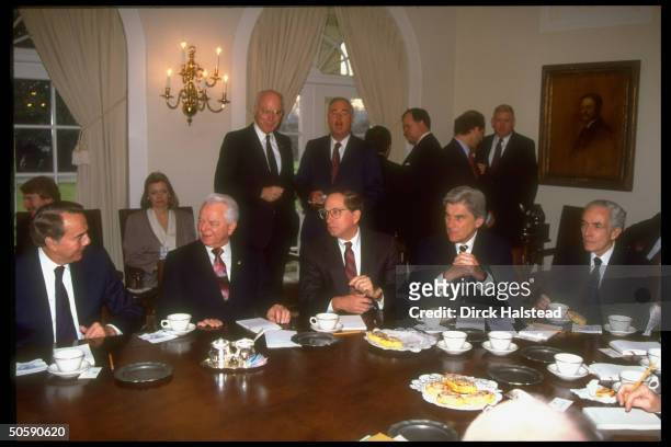 Senators Bob Dole, Robert Byrd, Sam Nunn, John Warner, and Claiborne Pell, during a meeting in the White House Cabinet Room on the Gulf crisis, with...