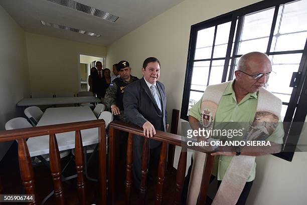 The president of the Honduran Supreme Court, Jorge Rivera , visits the mobile offices for hearings inaugurated near the national penitentiary in...