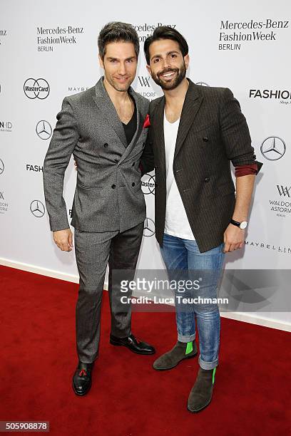 Christian Polanc and Serhat Yilmaz attend the Guido Maria Kretschmer show during the Mercedes-Benz Fashion Week Berlin Autumn/Winter 2016 at...