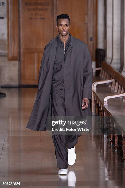 Model walks the runway during the Lemaire Menswear Fall/Winter 2016-2017 show as part of Paris Fashion Week on January 20, 2016 in Paris, France.