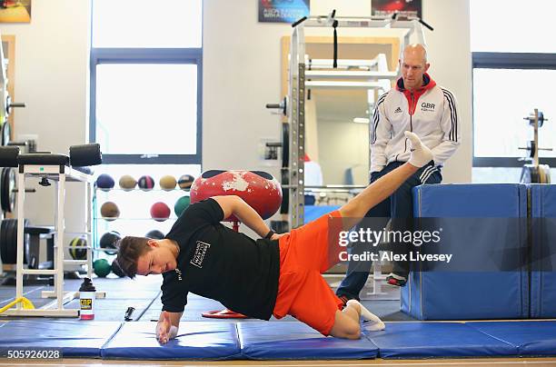 Brinn Bevan of the British Gymnastics Team is put through a workout by physio Nathan Ring during a rehab session at Lilleshall National Sports Centre...