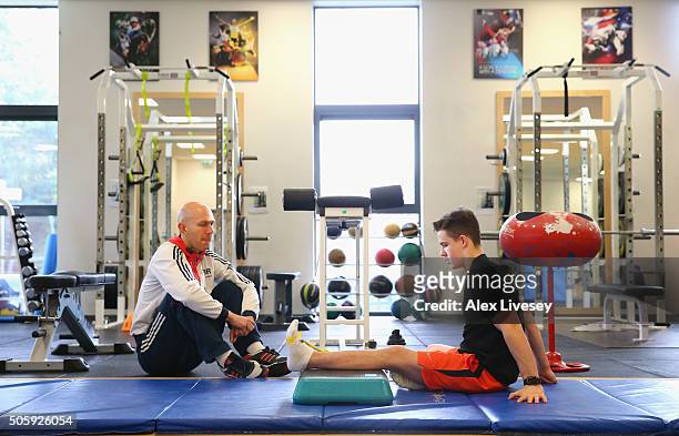 Brinn Bevan of the British Gymnastics Team is put through a workout by physio Nathan Ring during a rehab session at Lilleshall National Sports Centre...