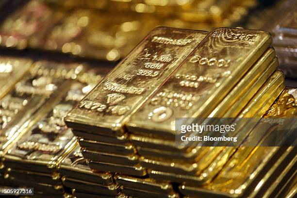One kilogram gold bars are displayed for a photograph at the YLG Bullion International Co. Headquarters in Bangkok, Thailand, on Wednesday, Jan. 13,...