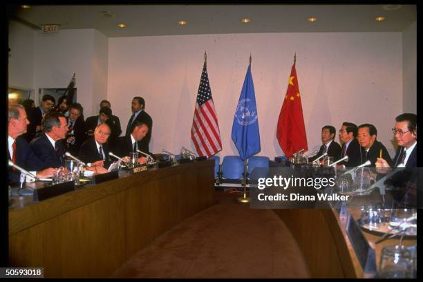 Pres. Bush flanked by Baker & Scowcroft facing Chinese PM Li Peng & team incl. Qian Qichen , mtg. At UN during Security Council summit.