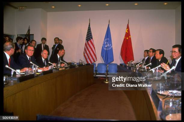 Pres. Bush flanked by Baker & Scowcroft facing Chinese PM Li Peng & team incl. Qian Qichen , mtg. At UN during Security Council summit.