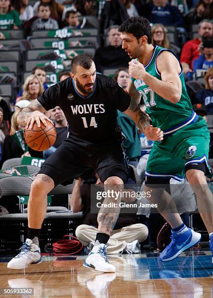 Nikola Pekovic of the Minnesota Timberwolves posts up against Zaza Pachulia of the Dallas Mavericks on January 20, 2016 at the American Airlines...