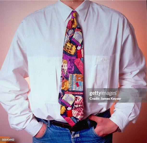 Man modelling tie by Nicole Miller based on headlines fr. NY POST incl. Best Sex I Ever Had & Page Six.