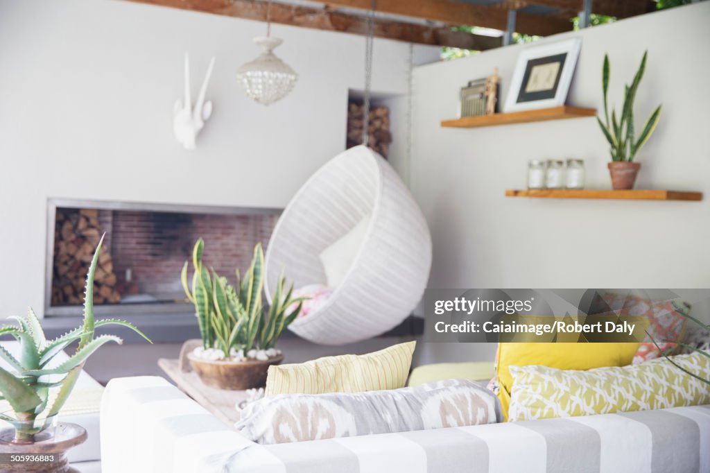 Sofa, chair and fireplace in modern living room