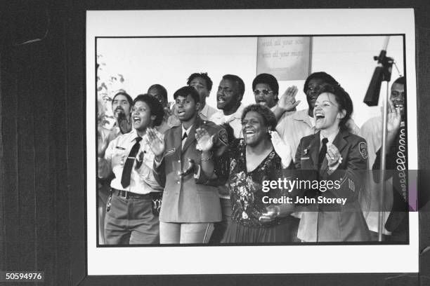 San Quentin Mass Choir performing song in the prison chapel; the choir is made up of male prisoners & 18 female staffers, including prison guards;...