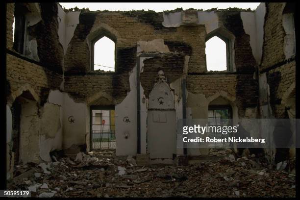 Shell of destroyed, burnt-out mosque , casualty of tri-ethnic civil war in former Yugoslav republic.