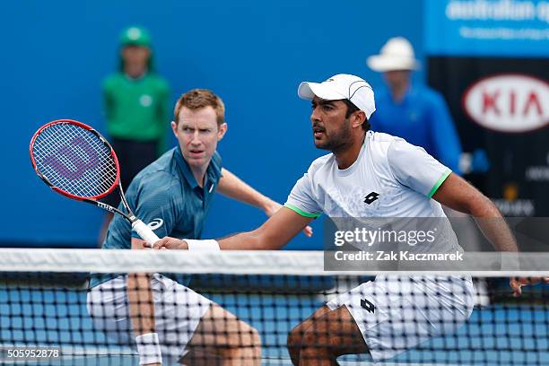 Jonathan Marray of Great Britain and Aisam-Ul-Haq Qureshi of Pakistan compete in their first round match against Jamie Murray of Great Britain and...