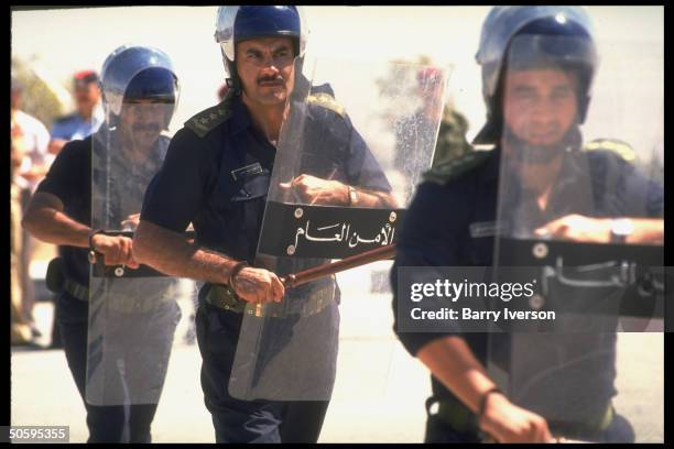 Future Palestinian police force under Israel/PLO Gaza Jericho autonomy peace plan training in riot control at Royal Police Academy.