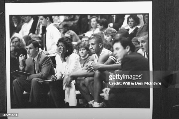 Bernadette Locke-Mattox, asst. Basketball coach at Univ. Of KY , shouting instructions while sitting on bench w. Asst. Coach Billy Donovan as head...