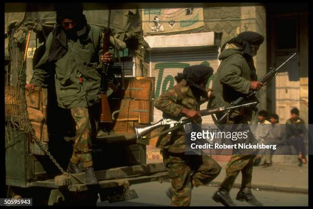 Sikh Indian army soldiers w. Black cloth-over-turban & beard serving w. Mostly BSF paramil. Forces enforcing curfew imposed on separatist-minded...
