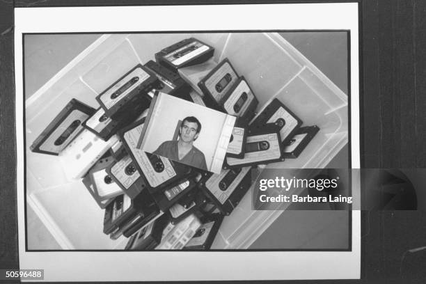 Plastic box containing photo of Thomas Michael Humphrey atop dozens of audio tapes filled w. Messages he sent to TX Sen. Bob Krueger & wife Kathleen...