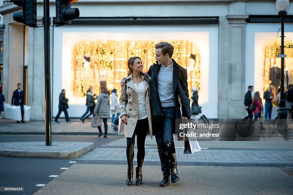 Happy couple out shopping