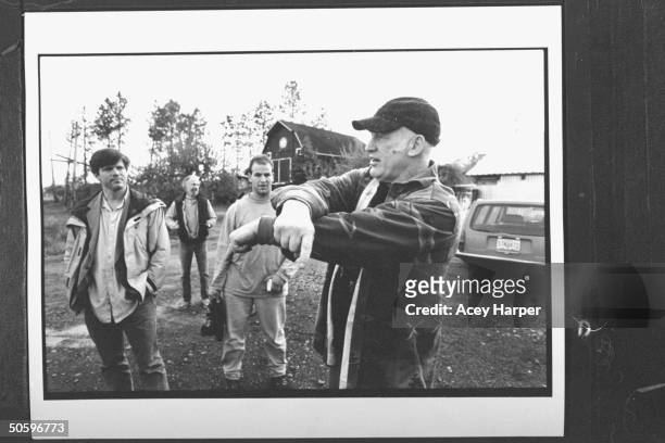 Hofstra Univ. Prof Douglas Brinkley chatting w. Author & '60s guru Ken Kesey & unident. Male student outside Kesey's home; Brinkley's & his An Amer....