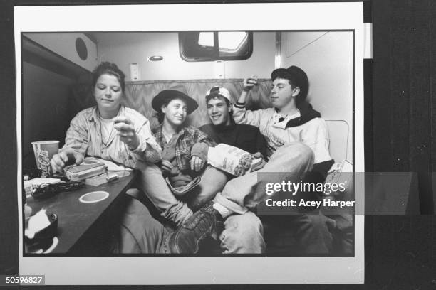 Hofstra Univ. Students Julie Jamilkowski, Rennie Gross, Jason Mendelsohn & Craig Gordon chatting w. Each other onboard the Majic Bus which they & 22...