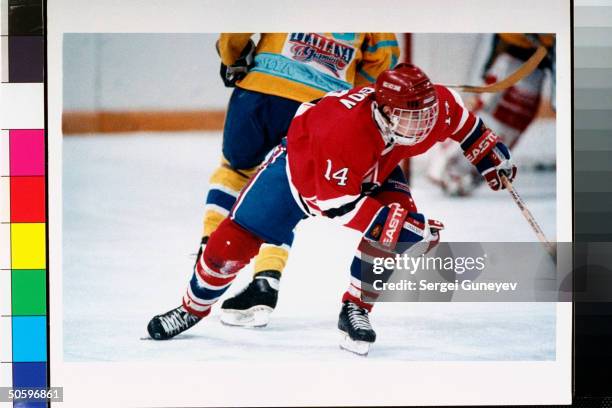 Red, white & blue-uniformed member of Russian Penguins ice hockey team during game at CSKA Arena, re new look for Penguins re Amer. Investing $1.2...