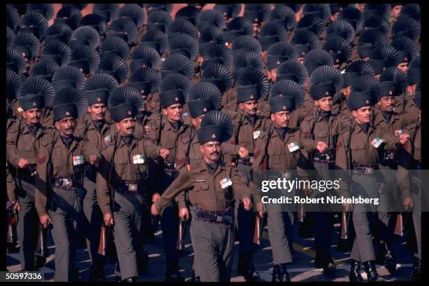 Soldiers in regimental dress uniform marching in annual Republic Day parade incl. Army, Navy, Air Force, Natl. Cadet Corps, para-mil. & auxiliary...