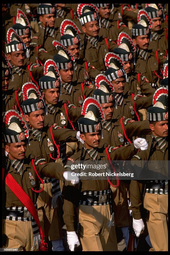 Soldiers in regimental dress uniform mar