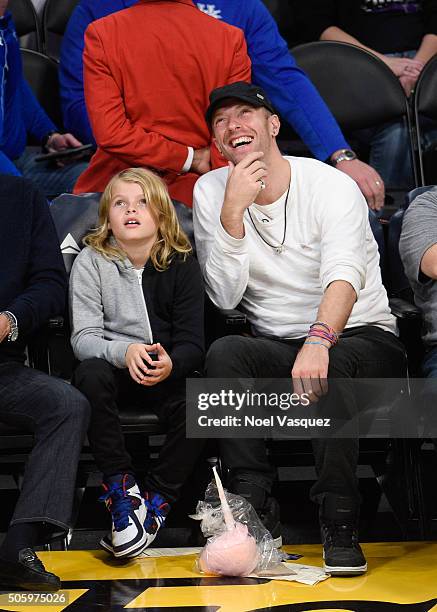 Chris Martin and his son Moses Martin attend a basketball game between the Sacramento Kings and the Los Angeles Kings at Staples Center on January...