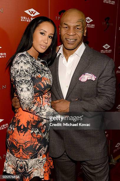 Mike Tyson and Kiki Tyson attend the Los Angeles Premiere of Well Go USA Entertainment's "IP MAN 3" at The Grove on January 20, 2016 in Los Angeles,...