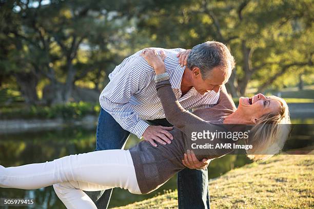 their love keeps them young at heart! - funny husband stock pictures, royalty-free photos & images