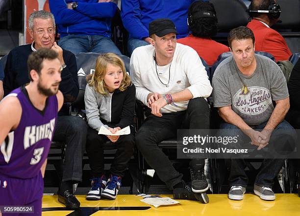 Chris Martin and his son Moses Martin attend a basketball game between the Sacramento Kings and the Los Angeles Kings at Staples Center on January...