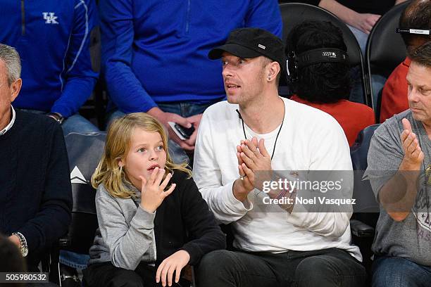 Chris Martin and his son Moses Martin attend a basketball game between the Sacramento Kings and the Los Angeles Kings at Staples Center on January...