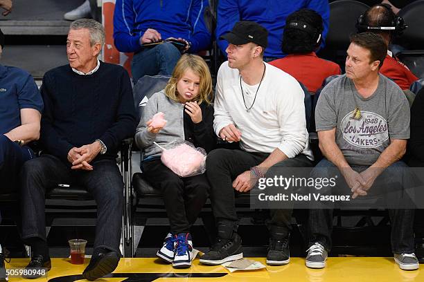 Chris Martin and his son Moses Martin attend a basketball game between the Sacramento Kings and the Los Angeles Kings at Staples Center on January...