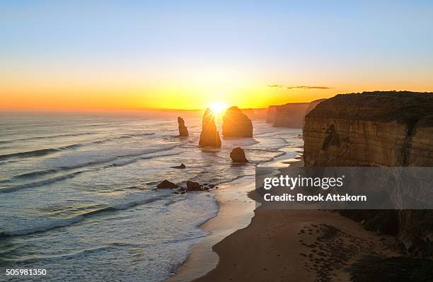 twelve apostles at sunset (great ocean road) - victoria australia landscape stock pictures, royalty-free photos & images