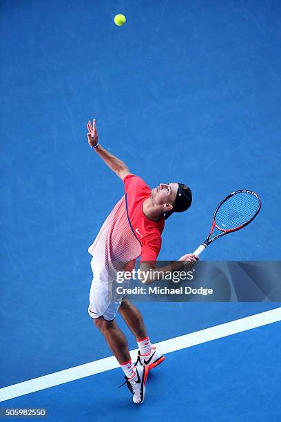 Omar Jasika of Australia serves in his first round doubles match with Nick Kyrgios of Australia against Rohan Bopanna of India and Florin Mergea of...