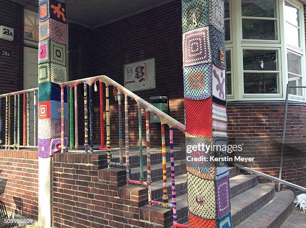 Yarn bombed hand rail and pillars