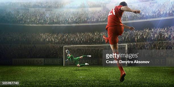 soccer game moment with goalkeeper - shootout stock pictures, royalty-free photos & images