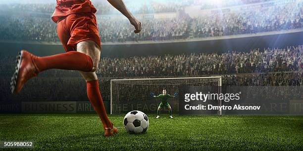 soccer game moment with goalkeeper - shootout stock pictures, royalty-free photos & images