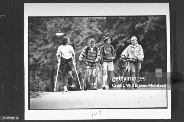 Univ. Of NC roommates & soccer teammates Tisha Venturini , Keri Sanchez, Mia Hamm & Angela Kelly walking to class together on the univ's campus;...