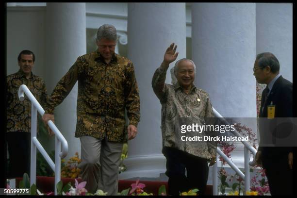 Batik-shirted APEC ldrs. Indonesia's Suharto, US Pres. Clinton & Chile's Eduardo Frei at Asia-Pacific Economic Cooperation summit.
