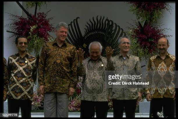 Batik-shirted APEC ldrs. Salinas de Gortari, Murayama, Suharto, Clinton & Sultan al Bokiah during APEC economic summit.