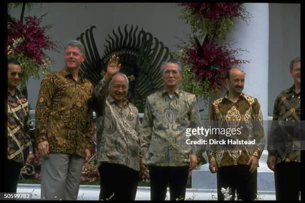 Batik-shirted APEC ldrs. Jim Bolger, Salinas de Gortari, Murayama, Suharto, Clinton & Sultan al Bokiah during APEC economic summit.