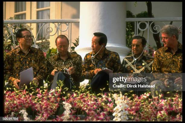 Batik-shirted APEC ldrs. Clinton, Sultan al-Bokiah, Kim Young Sam, MacLeod & Jiang Zemin during APEC economic summit.