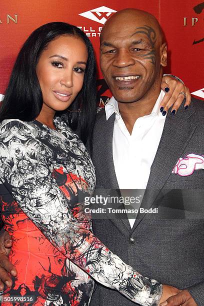 Mike Tyson and Kiki Tyson attend the premiere of Well Go USA Entertainment's "Ip Man 3" held at Pacific Theatres at The Grove on January 20, 2016 in...