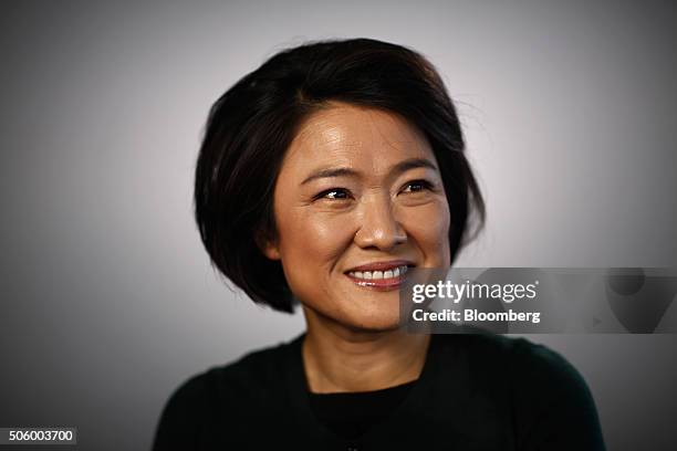 Zhang Xin, billionaire and chief executive officer of Soho China Ltd., poses for a photograph following a Bloomberg Television interview in Davos,...