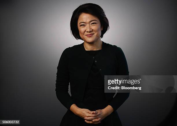 Zhang Xin, billionaire and chief executive officer of Soho China Ltd., poses for a photograph following a Bloomberg Television interview in Davos,...