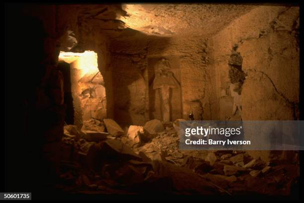 Statue of Osiris, god of dead, on back wall of new Tomb 5 site under excavation in Valley of Kings, likely burial place of 50 sons of Pharaoh Ramses...