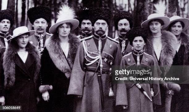 The Romanovs visiting a regiment during World War I. From left to right, Grand Duchess Anastasia, Grand Duchess Olga, Tsar Nicholas II, Tsarevich...