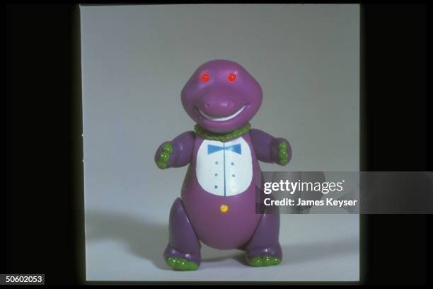Plastic figure of Barney the dinosaur fr. PBS's children's program Barney & Friends.